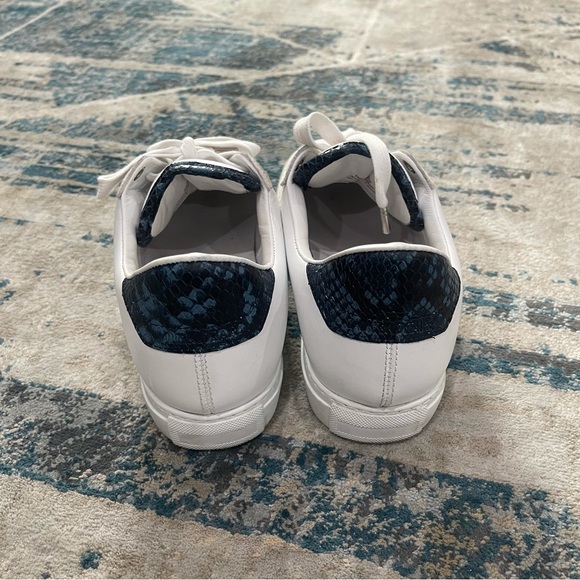 New Zadig and Voltaire,
White with a snake print flash on the side. - Picture 3 of 6